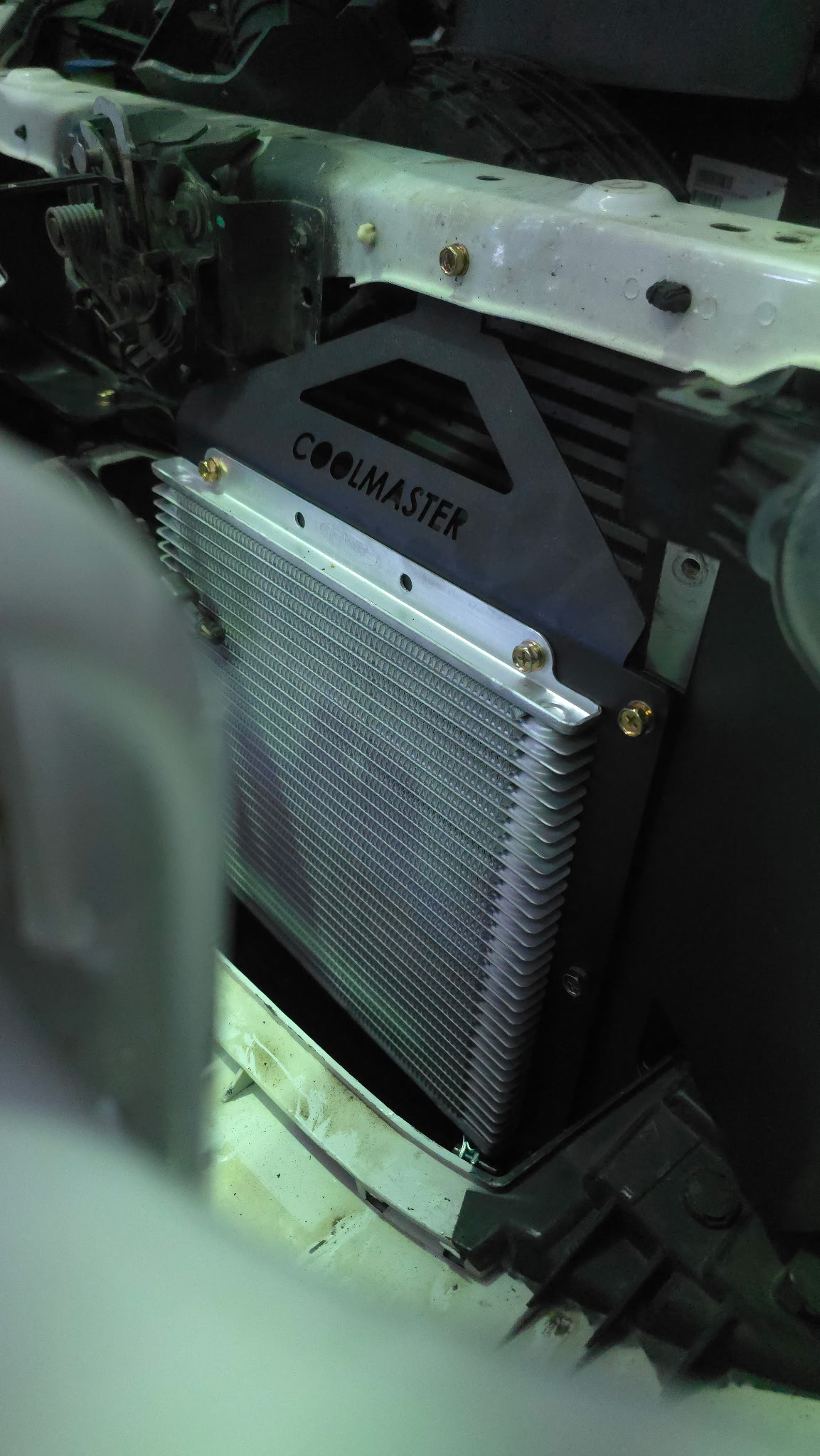 Coolmaster external transmission oil cooler installed in a 4WD