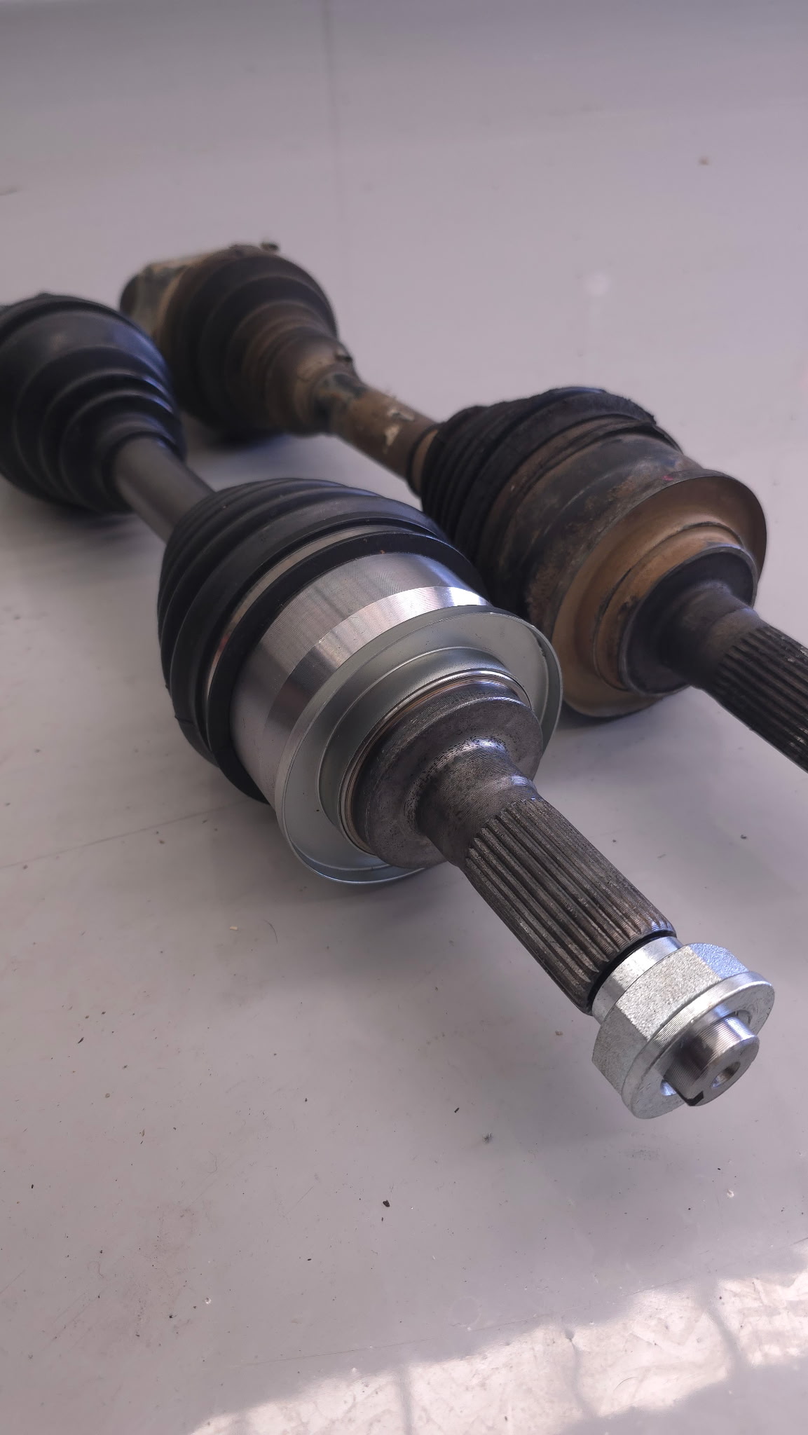 New CV axles ready for install at Auto Labs workshop