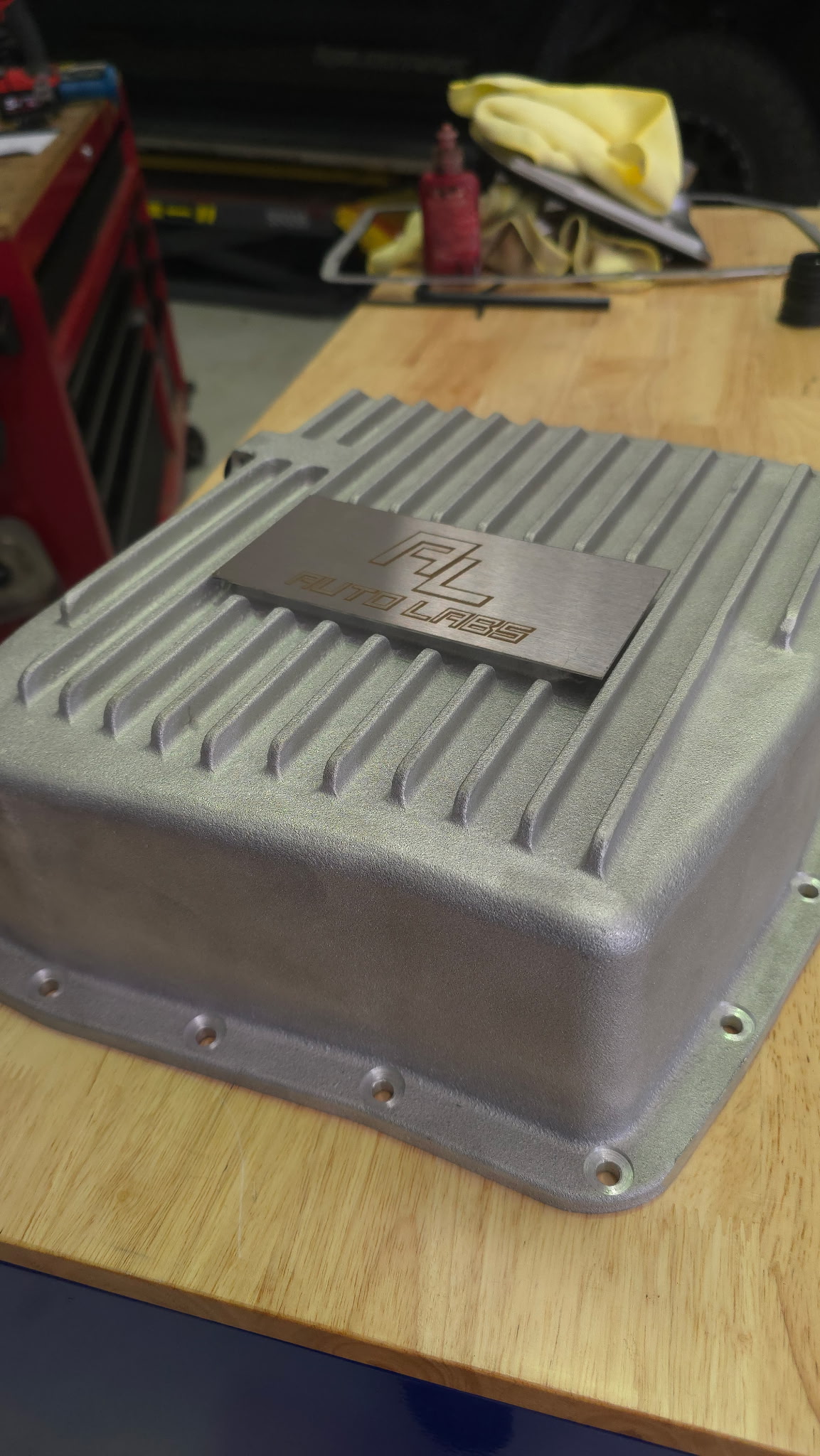 Custom deep-cast transmission pan with engraved Auto Labs badge